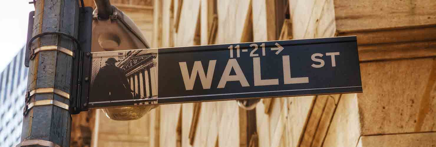 Wall Street sign on street post