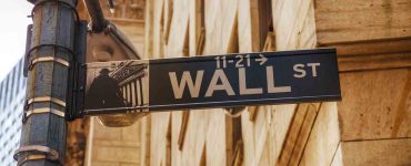 Wall Street sign on street post