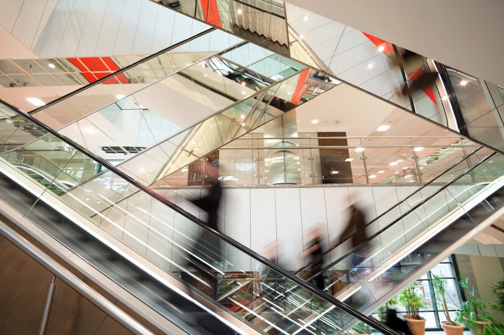 series of escalators with mirrored sides