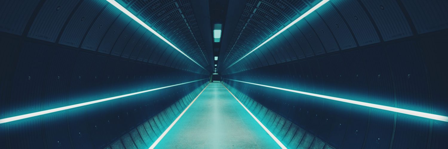 Cool underground tunnel with nice vanishing point and neon lights.