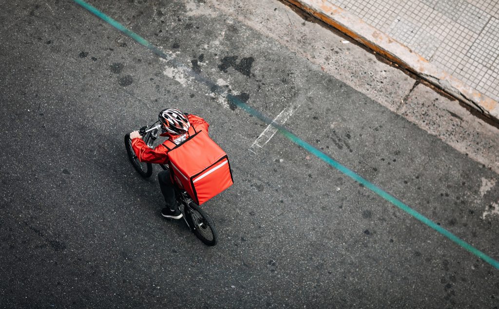 Delivering Food on Bicycle In City